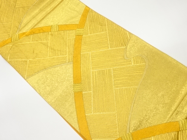 抽象曲線に檜垣模様織出し袋帯